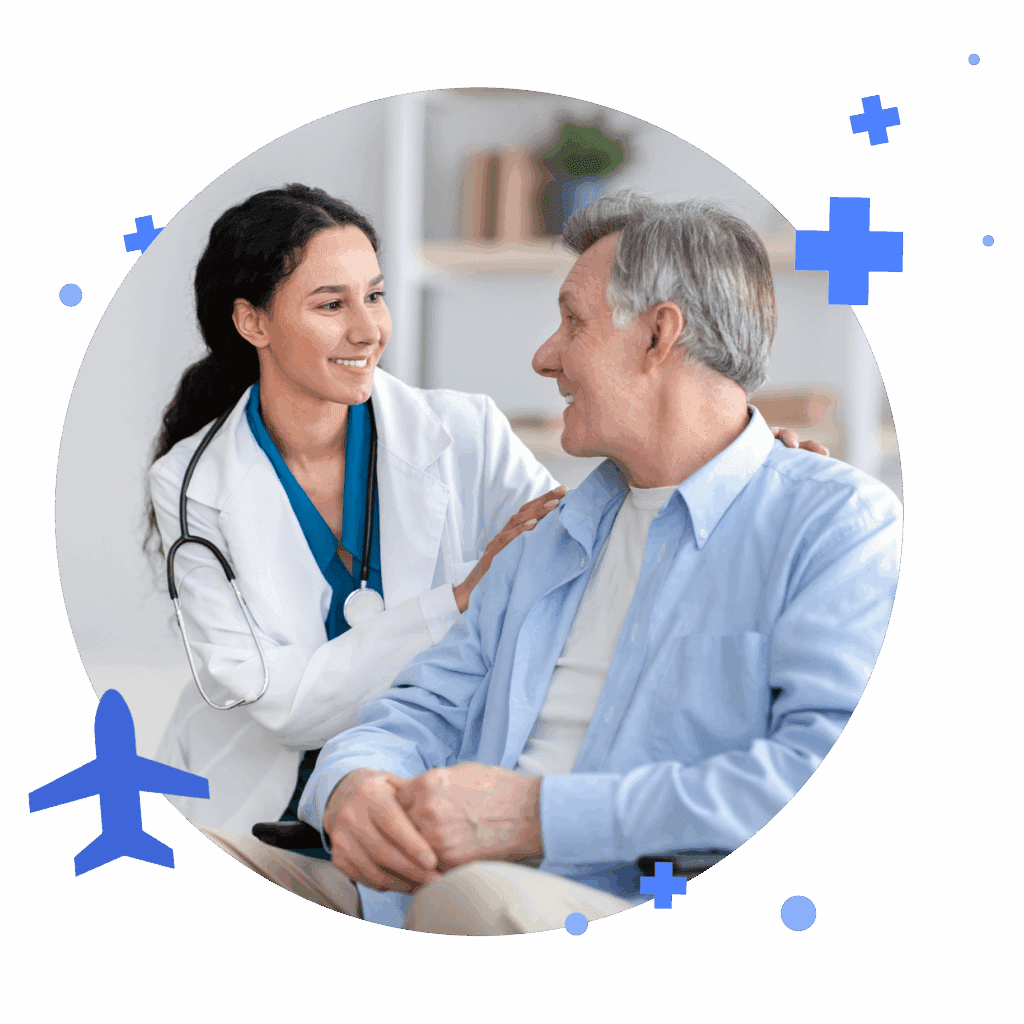 A doctor smiles while interacting with an older patient in a bright clinic, emphasizing compassionate healthcare and trust.